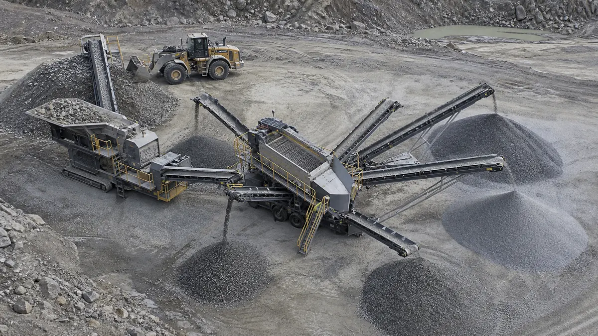 Mobile screen plant layout after crusher with multiple conveyors and aggregate stockpiles